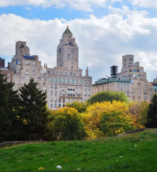 New York City Manhattan Central Park panorama in Autumn with colorful trees and skyscrapers.